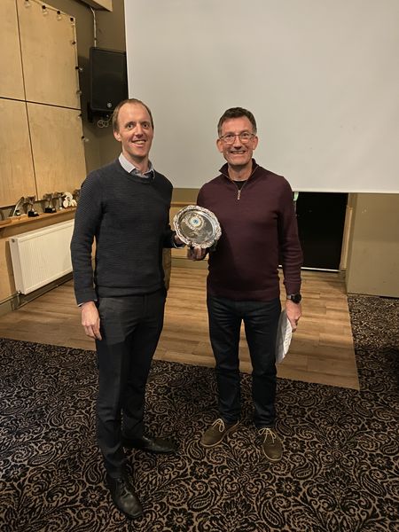 Dave Mills collecting award for Most Improved rider 2022