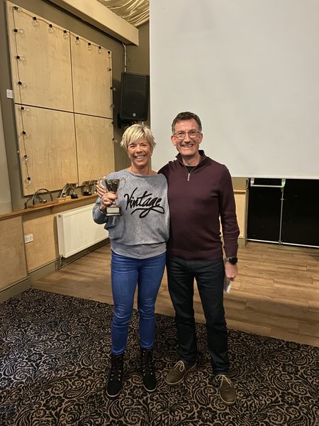 Sara Northover collecting award for Triathlon Champion 2022